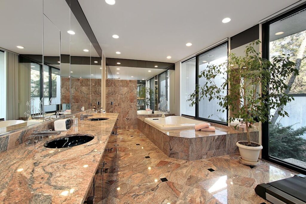 freestanding bathtub with granite floor